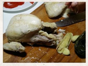 Recipe Hainan Chicken Rice; Cut away the thighs, remove stuffing